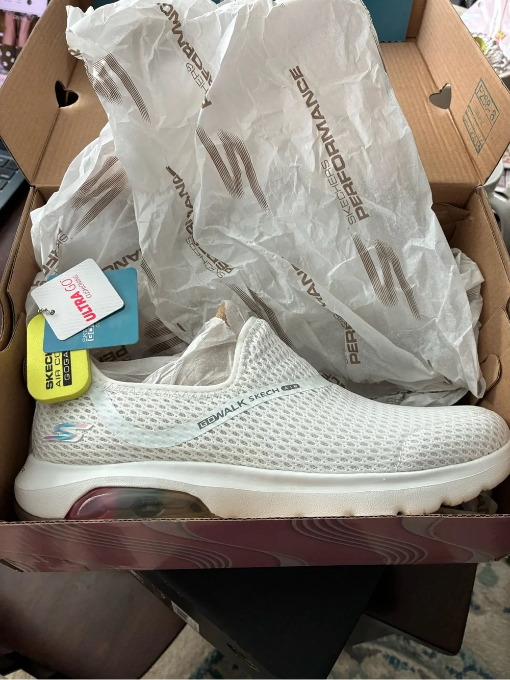 Skechers White Slip-On Sneakers with Rainbow Heel Bubble